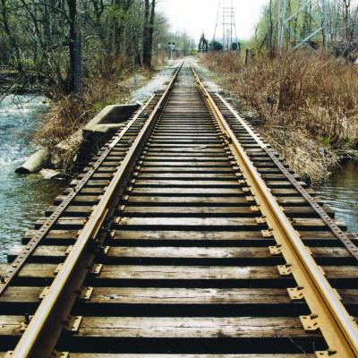 Confluence of the Whippanong River (left) and Stony Brook (right)—as seen from the railroad tressel overhead— looking towards the back fo the Wippany Post Office